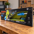 Mongoose Force 1.0 LED wheel scooter in original lime and blue retail packaging, styled garage setting