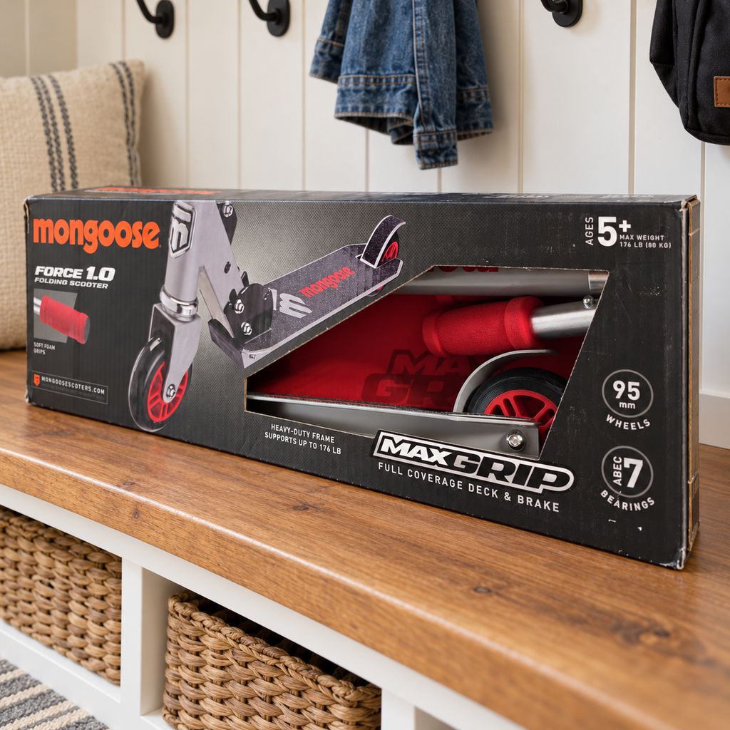 Mongoose Force 1.0 red and silver scooter in original retail packaging, styled mudroom setting