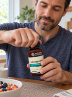 Opening a Nature's Sunshine Ashwagandha bottle at breakfast.
