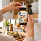 Taking Garden of Life Organics Turmeric from an upper cupboard