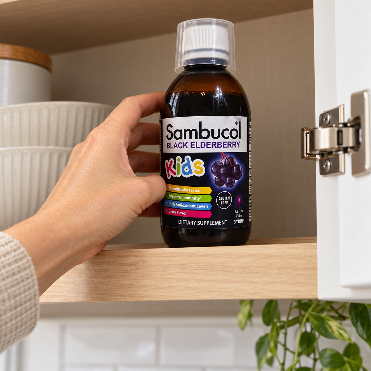 Storing Sambucol Kids 7.8 fl oz in an upper cupboard