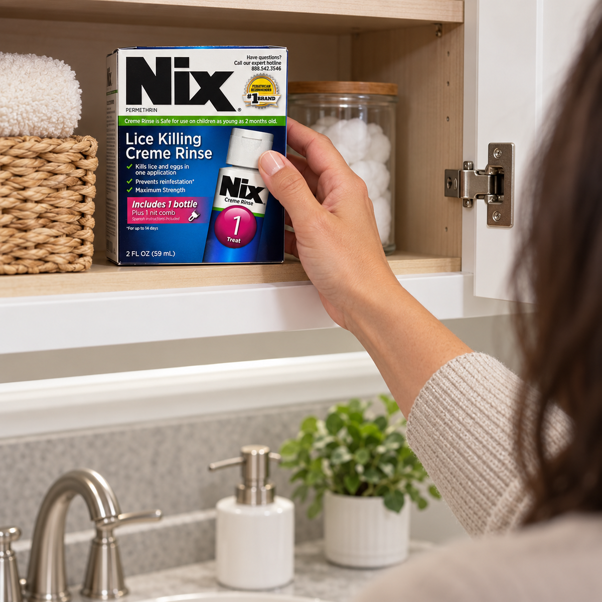 Retrieving a Nix Creme Rinse kit from an upper cupboard