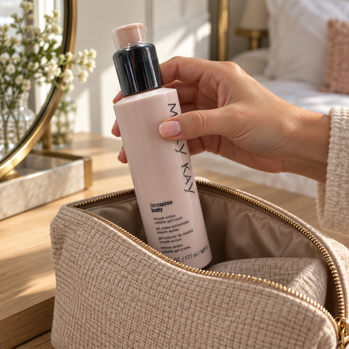 Mary Kay TimeWise Body gel cream being packed in a fabric toiletry bag
