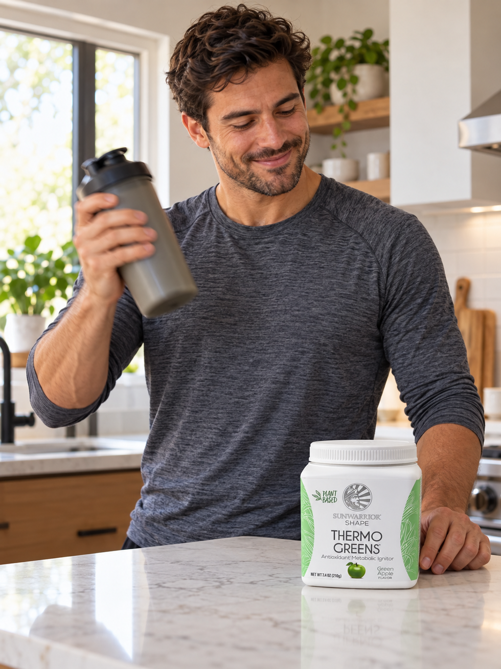 Shaking a drink with Sunwarrior Thermo Greens Green Apple nearby.