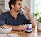 A daily supplement routine with Zhou Black Seed Oil and a glass of water.