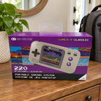 My Arcade Gamer V Classic retail box in a travel-ready entryway setting