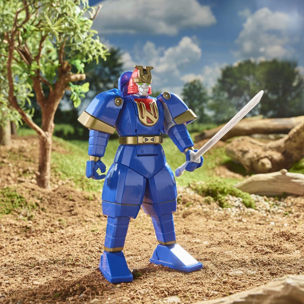 Retro-Morphin Ninjor with its red-and-gold head and chest showing, holding a sword in an outdoor diorama.