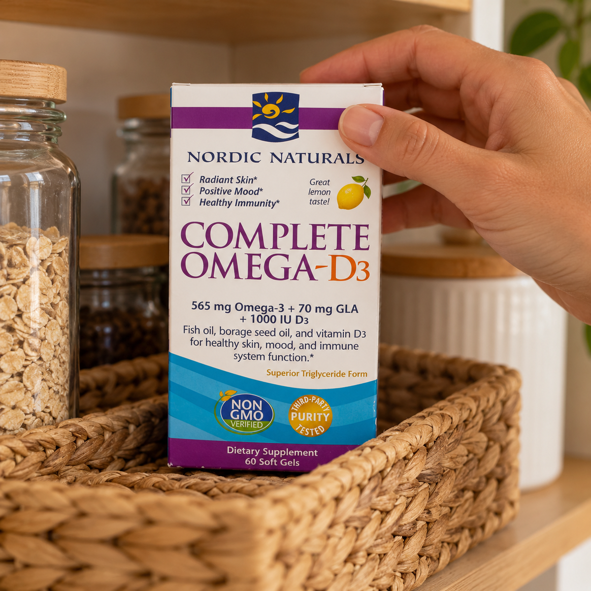Nordic Naturals Complete Omega-D3 60-soft-gel box being placed in a pantry basket