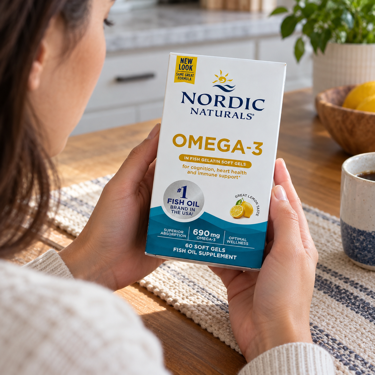Reading the front of a Nordic Naturals Omega-3 fish-gelatin carton