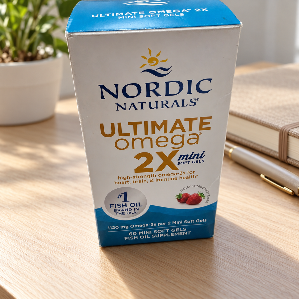 AI-styled illustrative organized scene with Nordic Naturals Ultimate Omega 2X Mini Strawberry box; props not included