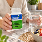 Nutri Advanced Calcium D-Glucarate bottle held beside a glass of water