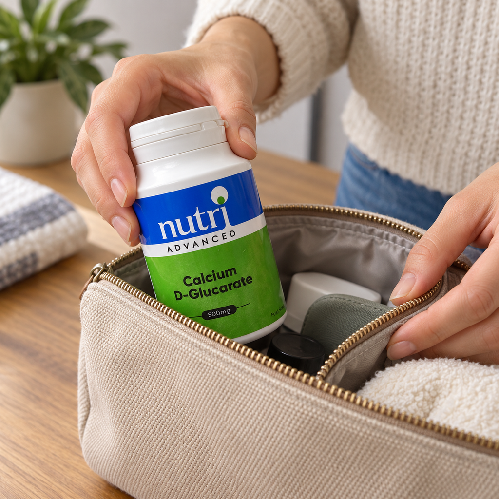 Adult packing Nutri Advanced Calcium D-Glucarate into a travel pouch