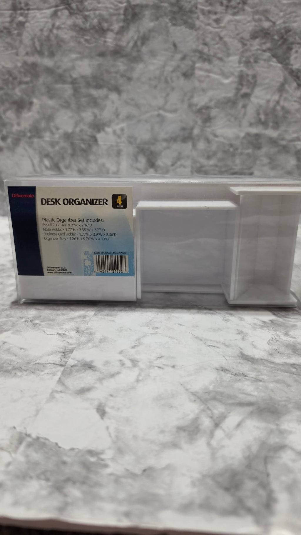 Actual Officemate four-piece white desk organizer set in its original clear package