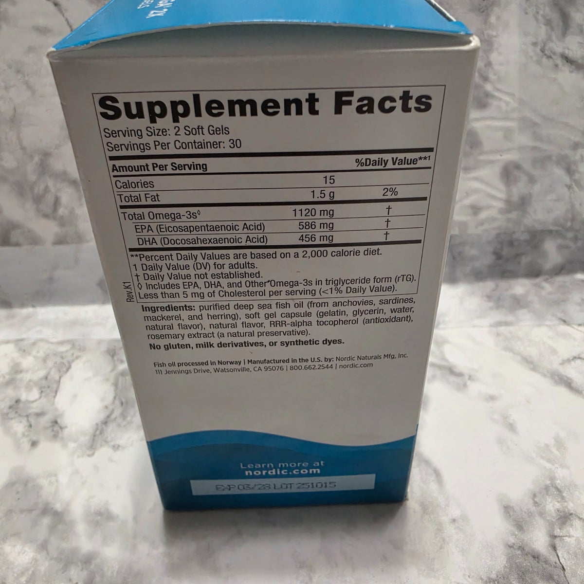 Original photograph of actual Ultimate Omega 2X Mini Strawberry box showing Supplement Facts and fish oil ingredients