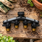 Orbit Pro Flo four-port hose manifold on an outdoor potting bench