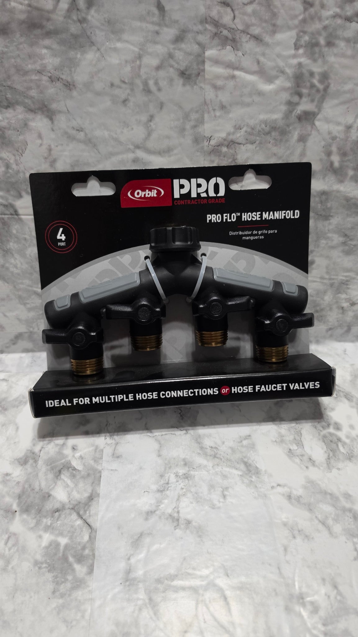 Actual Orbit Pro Flo 56832 four-port hose manifold in its original retail package