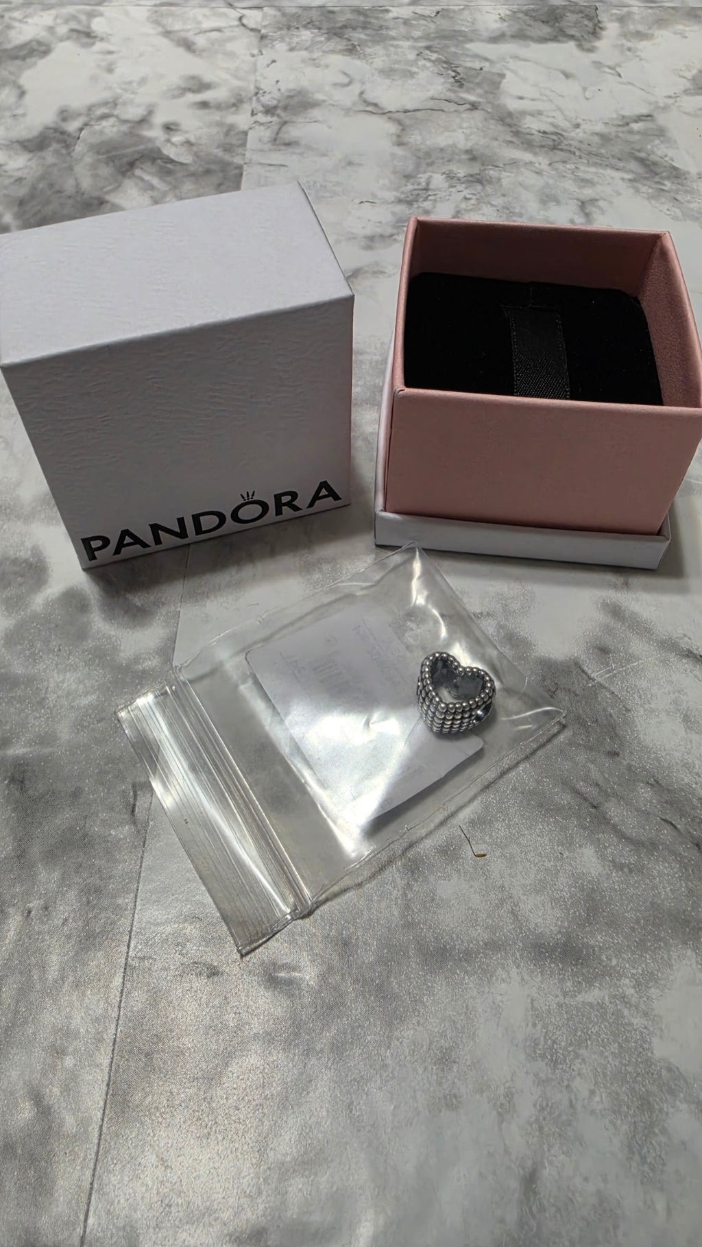 Actual Pandora 797516 charm and included box