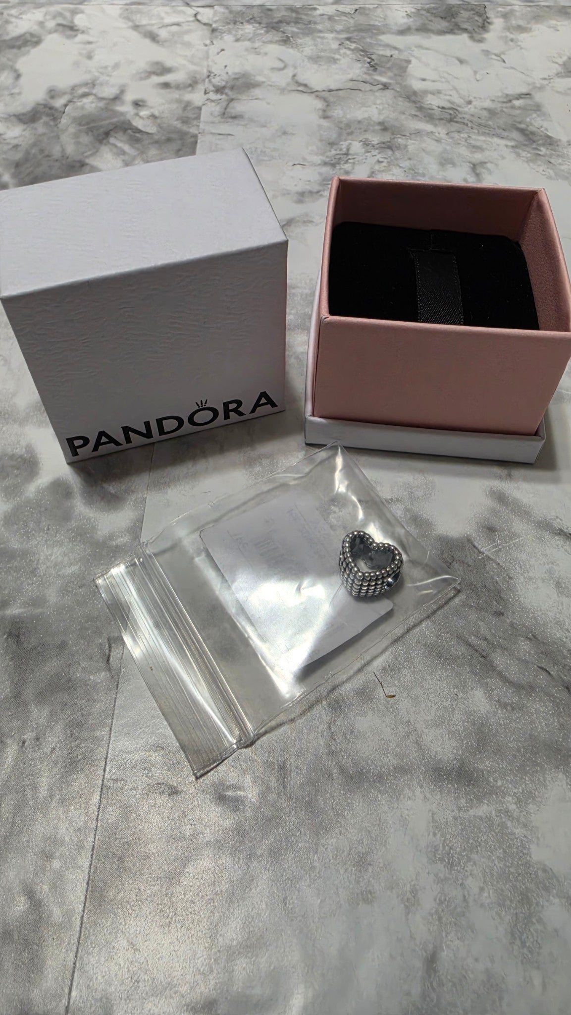 Actual Pandora 797516 charm and included box