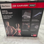 Original photograph of actual Ab Carver Pro box showing spring, grips, wide wheel and included knee pads