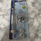 Actual PF WaterWorks EasyPOPUP PF0905 ball rod assembly in its blister package on a marble-pattern surface.