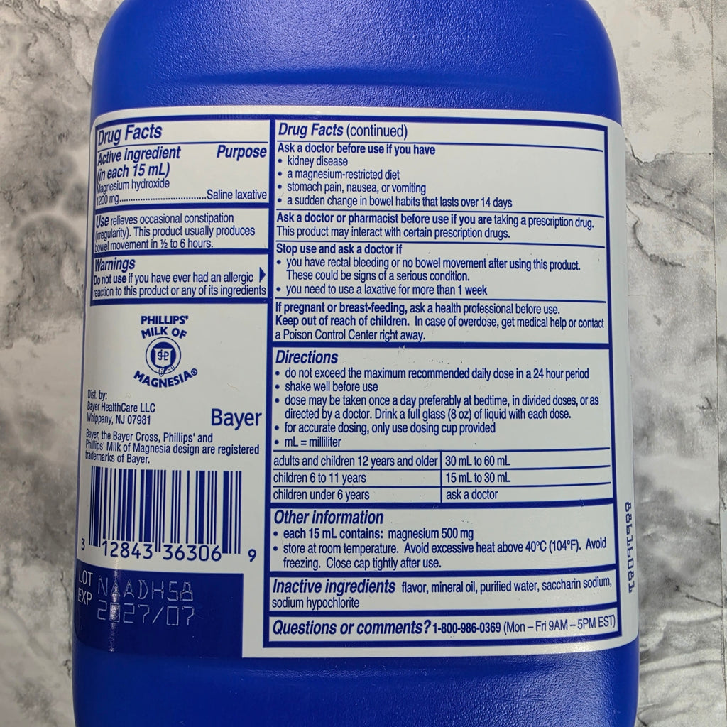 Actual stocked Phillips' Milk of Magnesia Fresh Mint 26 oz bottle Drug Facts label