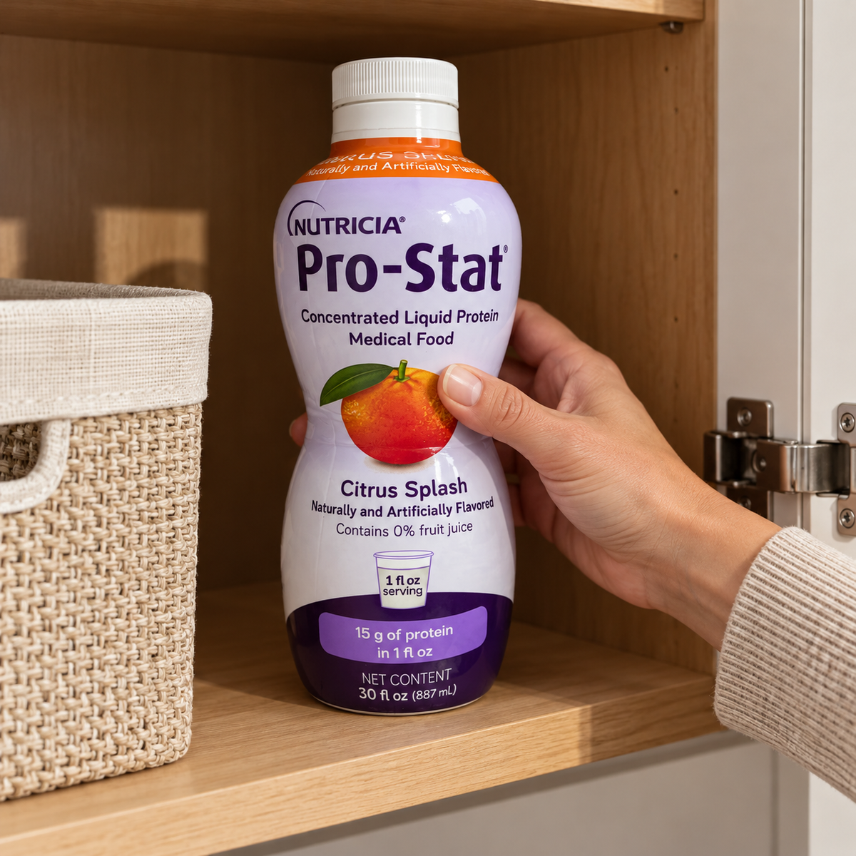 An adult placing a closed Pro-Stat Citrus Splash 30-fl-oz bottle in a dry cupboard