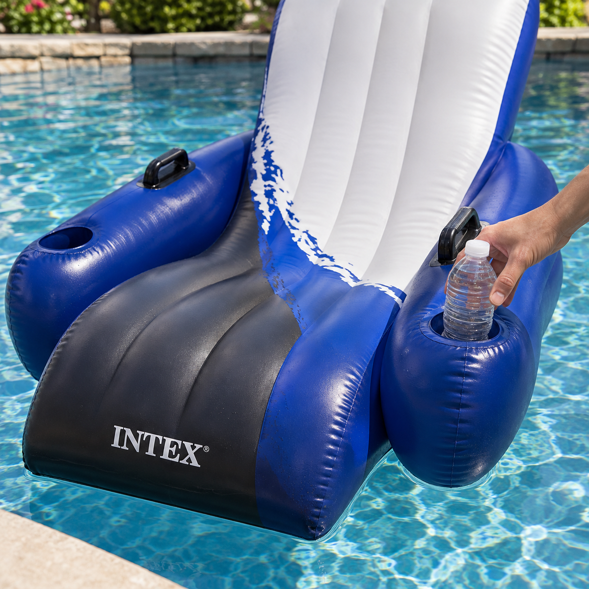 Placing a water bottle in the Intex Floating Recliner cup holder