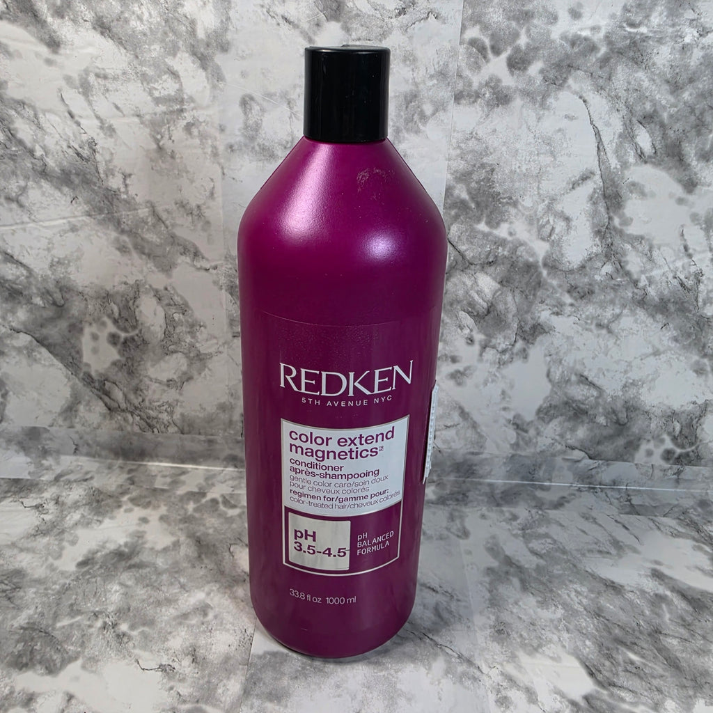 Actual inventory photo of Redken Color Extend Magnetics Conditioner 33.8 fl oz bottle