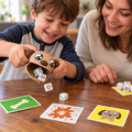 Illustrated family game scene with a child rolling picture dice from the You Little Stinker dog shaker while an adult plays alongside.