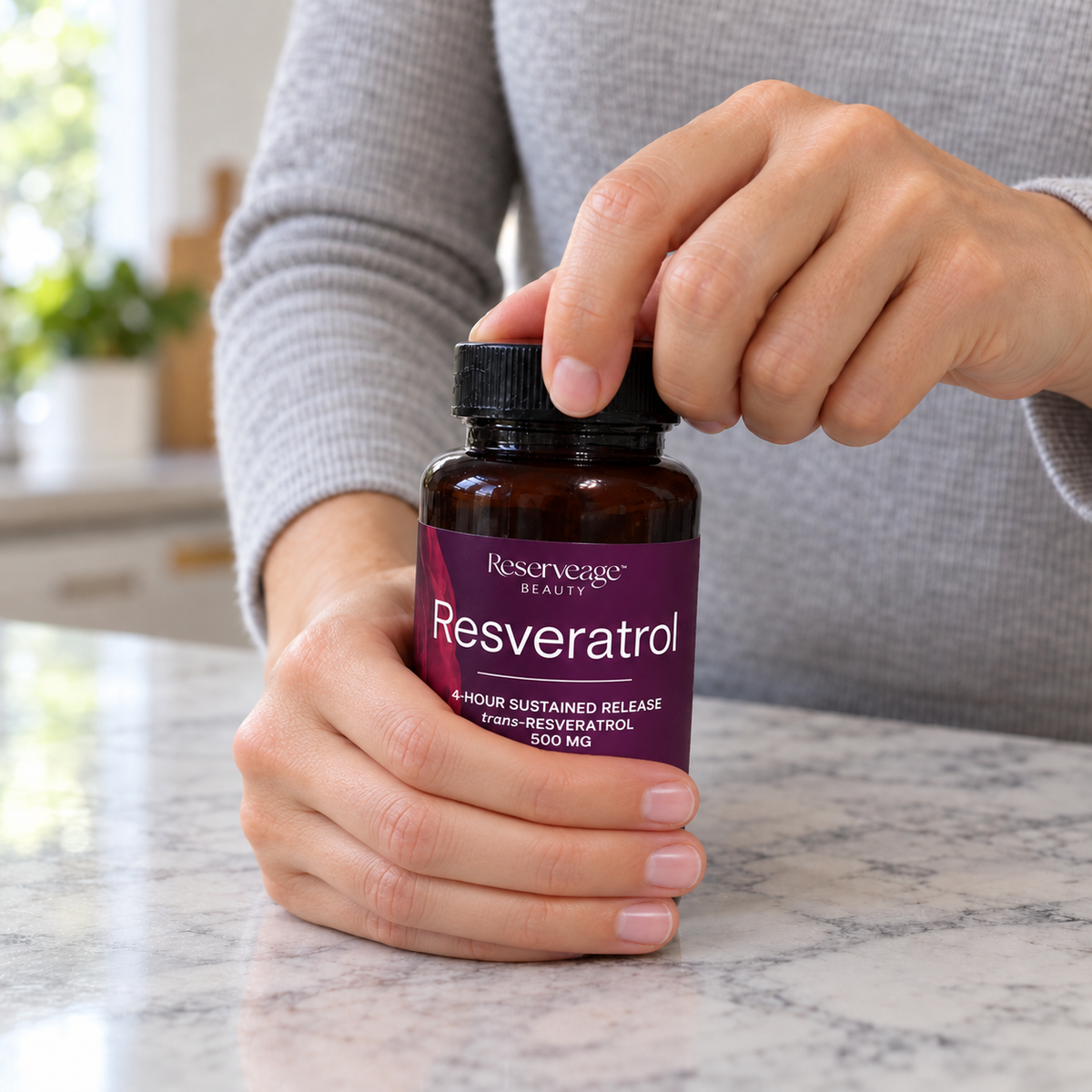 Adult twisting open a Reserveage Beauty Resveratrol 500 mg bottle.