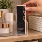Placing boxed Mary Kay Reviving Facial Spray upright in a shelf organizer