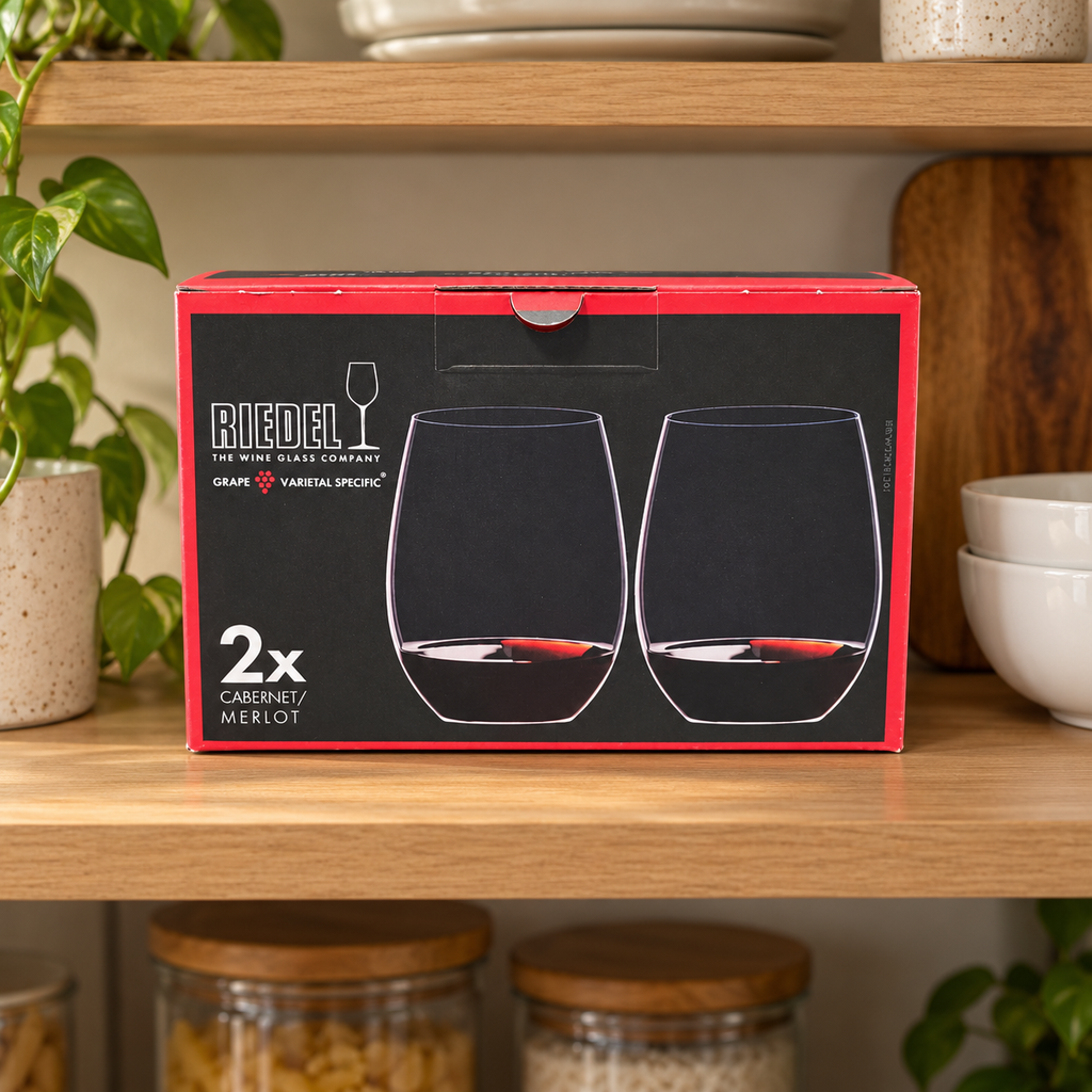 AI-generated lifestyle illustration of one closed RIEDEL O Cabernet/Merlot two-piece box in a cabinet shelf setting. Background props not included.