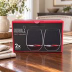 AI-generated lifestyle illustration of one closed RIEDEL O Cabernet/Merlot two-piece box in a dining table setting. Background props not included.