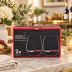 AI-generated lifestyle illustration of one closed RIEDEL O Cabernet/Merlot two-piece box in a housewarming table setting. Background props not included.