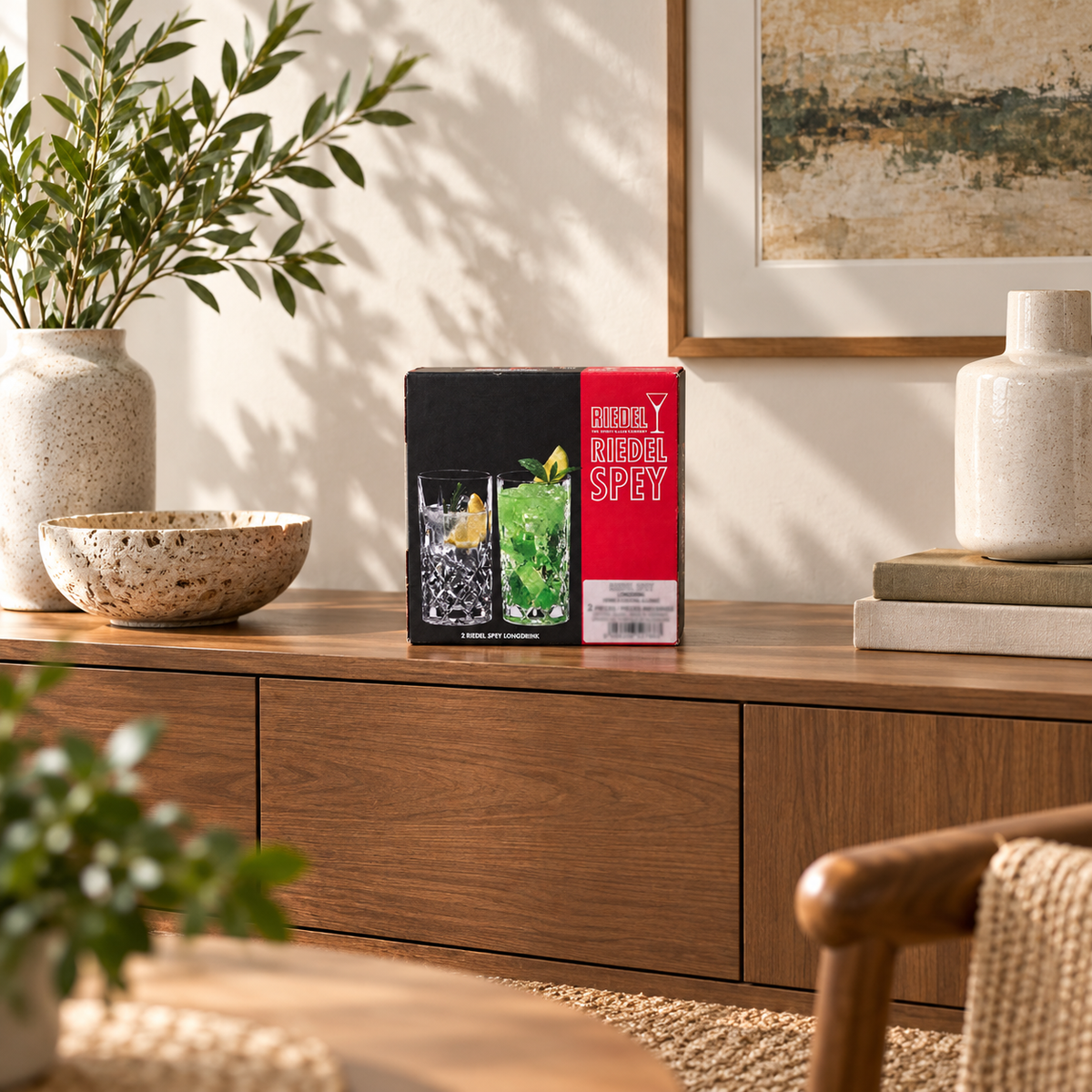 AI-generated lifestyle scene of one closed Riedel Spey Longdrink two-piece glass box on a sideboard. Props not included.