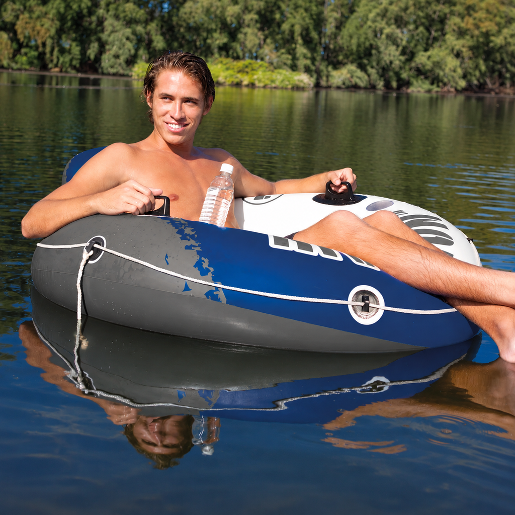 Relaxing in an Intex River Run tube on a calm lake