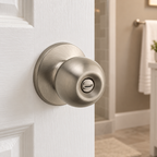 Safe Lock Regina Satin Nickel privacy knob on a guest bathroom door, lifestyle illustration