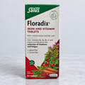 Salus Floradix Iron and Vitamin Tablets 84-count vegan box with visible carton wear on a clean square background