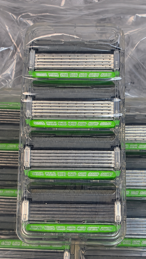 Close view of the central four-cartridge Schick Hydro 5 tray from actual stock; each order includes one tray of four cartridges, without a handle or retail box