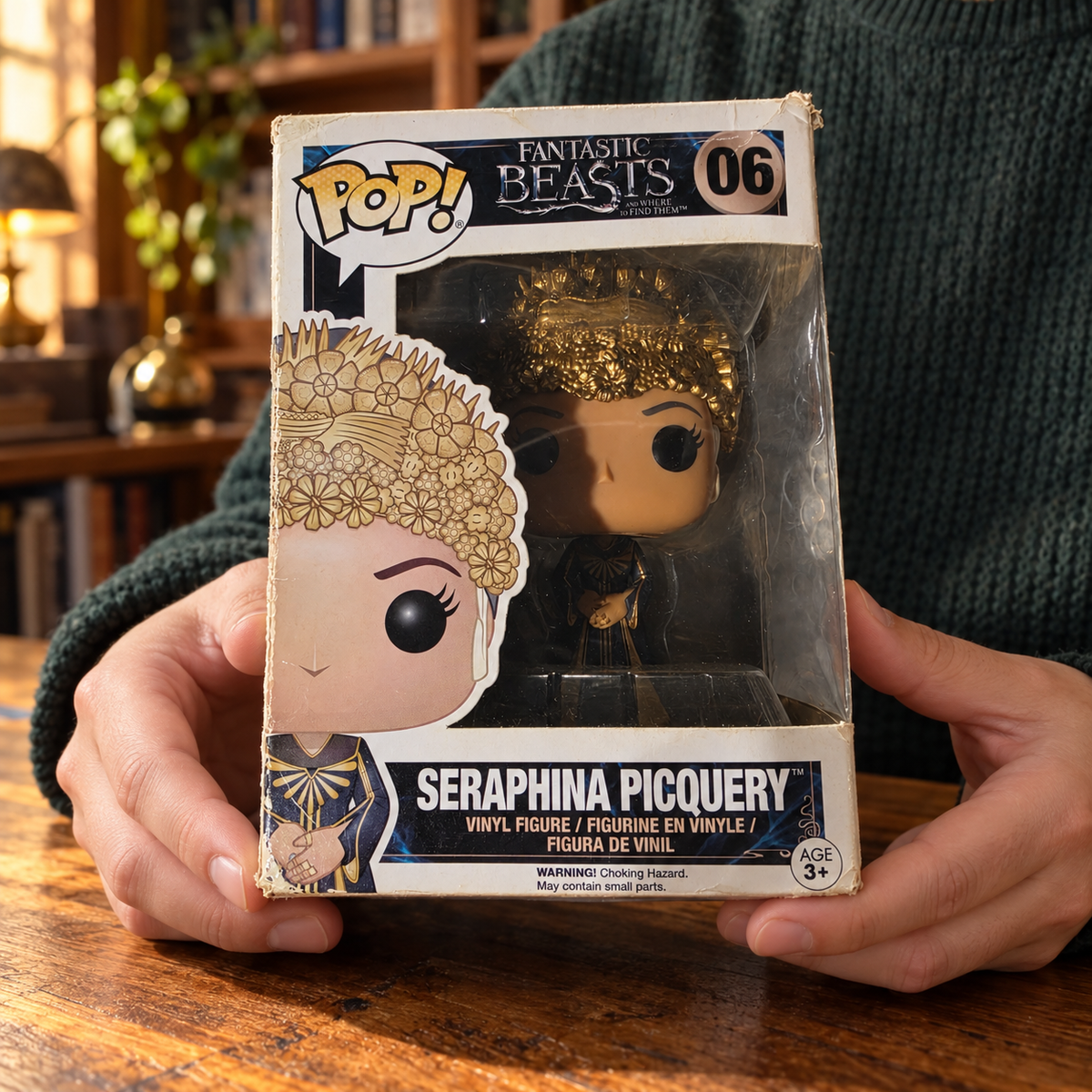 Boxed Funko Pop! Seraphina Picquery #06 being examined by a collector.