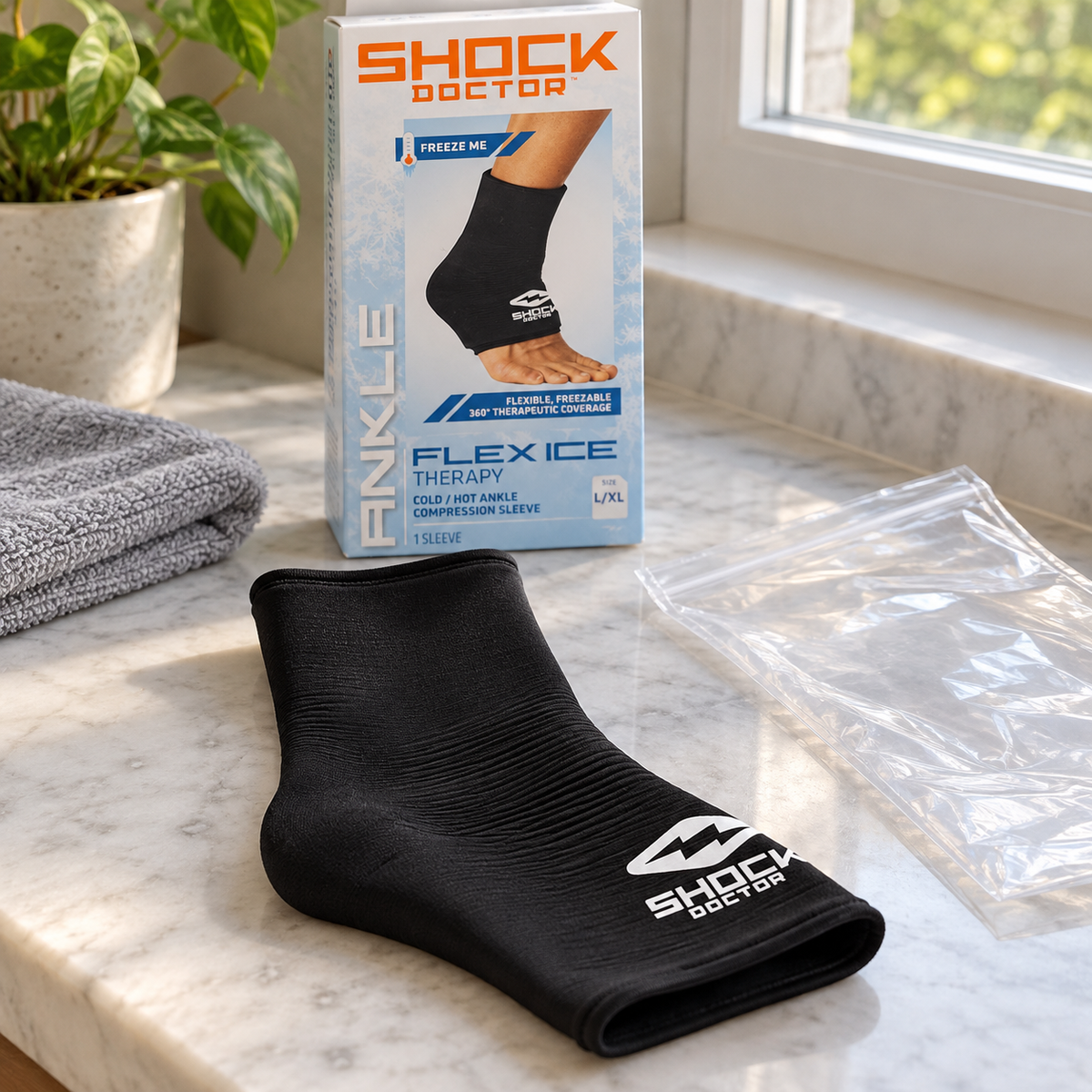 Shock Doctor Flex Ice ankle sleeve laid flat to dry beside its protective bag