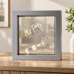 AI-generated lifestyle illustration of the silver Let's Party LED light box on an entry console; background accessories not included.