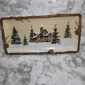 St. Nicholas Square Snow Valley rectangular platter with snowy cabin and raised brown pinecone border