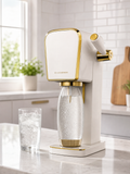 SodaStream ART Gold sparkling water maker lifestyle image in modern kitchen - illustrative