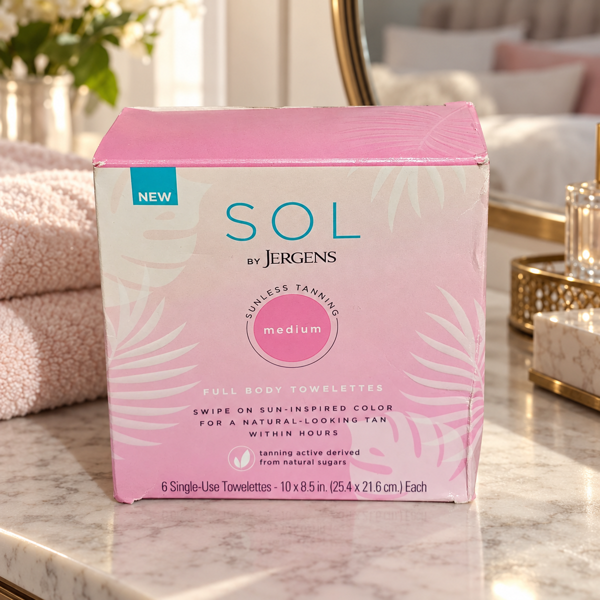AI-generated lifestyle scene of one closed SOL by Jergens medium six-towelette box in a dressing table setting. Props not included.