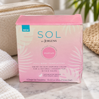 AI-generated lifestyle scene of one closed SOL by Jergens medium six-towelette box in a travel table setting. Props not included.