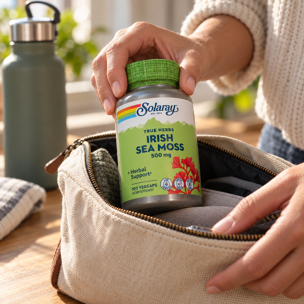 Adult packing a Solaray Irish Sea Moss bottle into a travel pouch