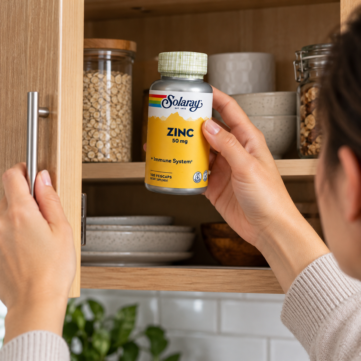 Taking Solaray Zinc 50 mg from an upper cabinet