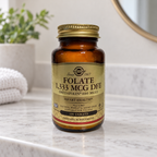 Solgar Folate 1,333 mcg DFE, 100-tablet amber bottle on a light bathroom shelf