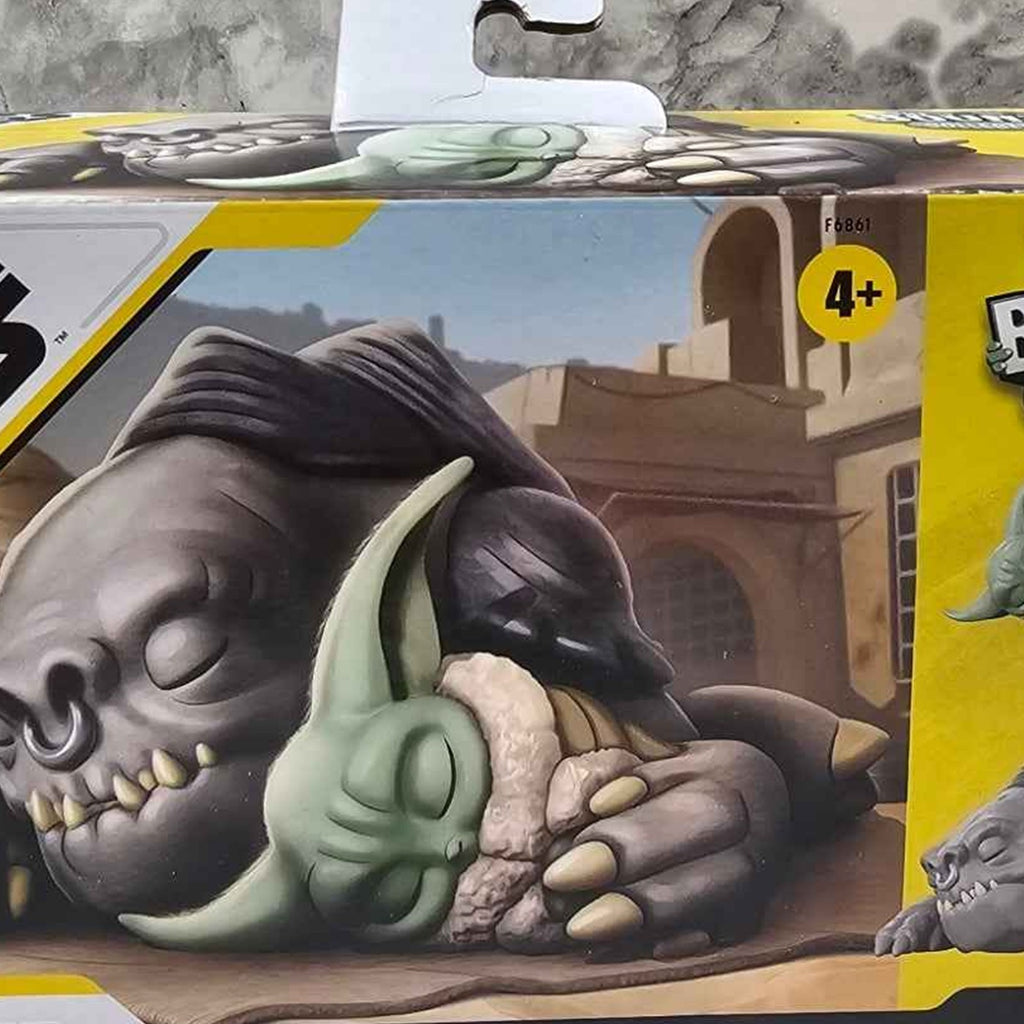 Actual photo detail of Grogu and Rancor characters on Star Wars The Bounty Collection package